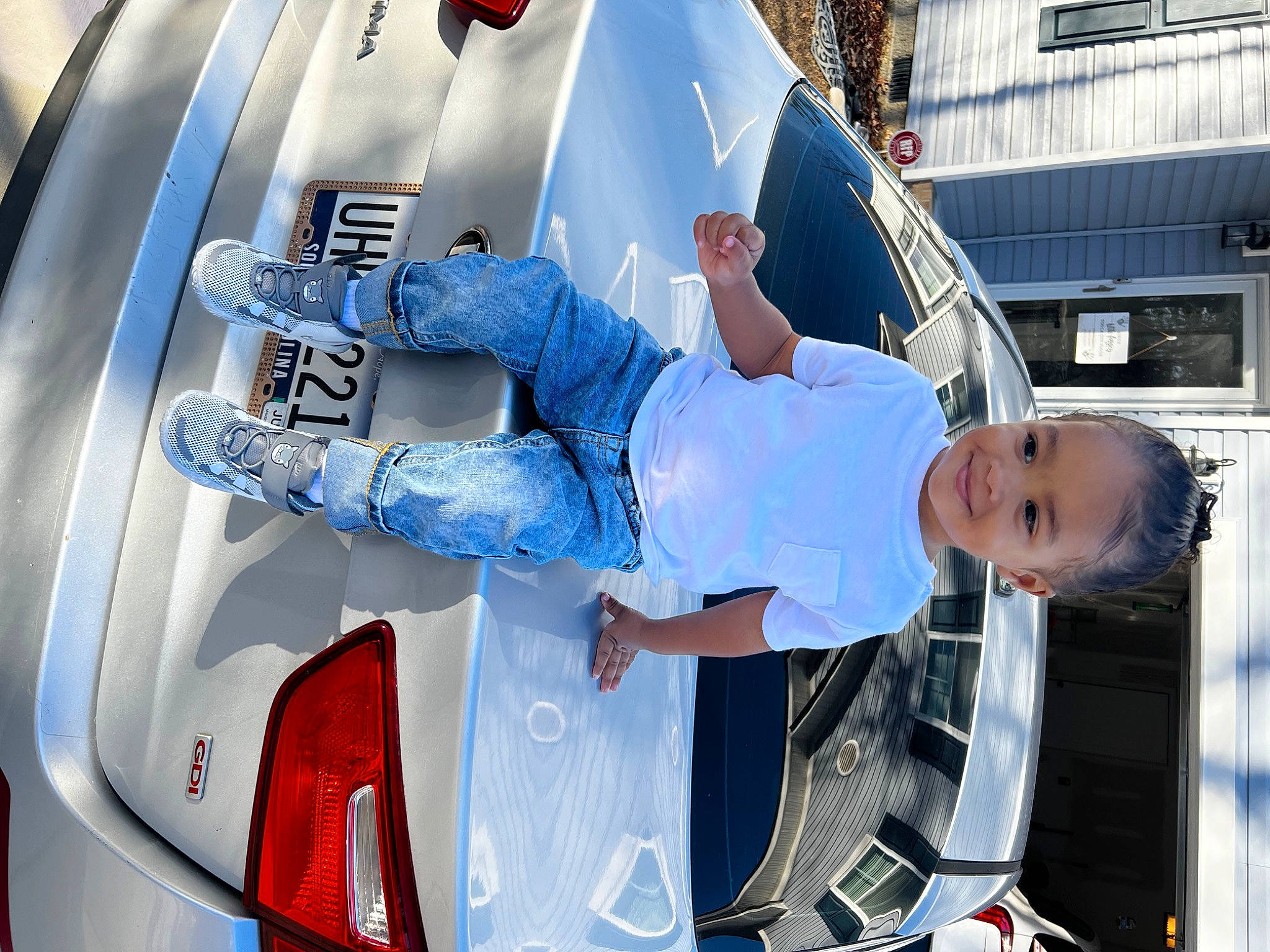 Kalii is registered to the contest to win money with this photo: auto_part, automotive_design, automotive_exterior, automotive_lighting, automotive_tail_brake_light, automotive_tire, automotive_wheel_system, bumper, car, electric_blue, engineering, fender, hood, joy, light, motor_vehicle, person, personal_luxury_car, tire, trunk