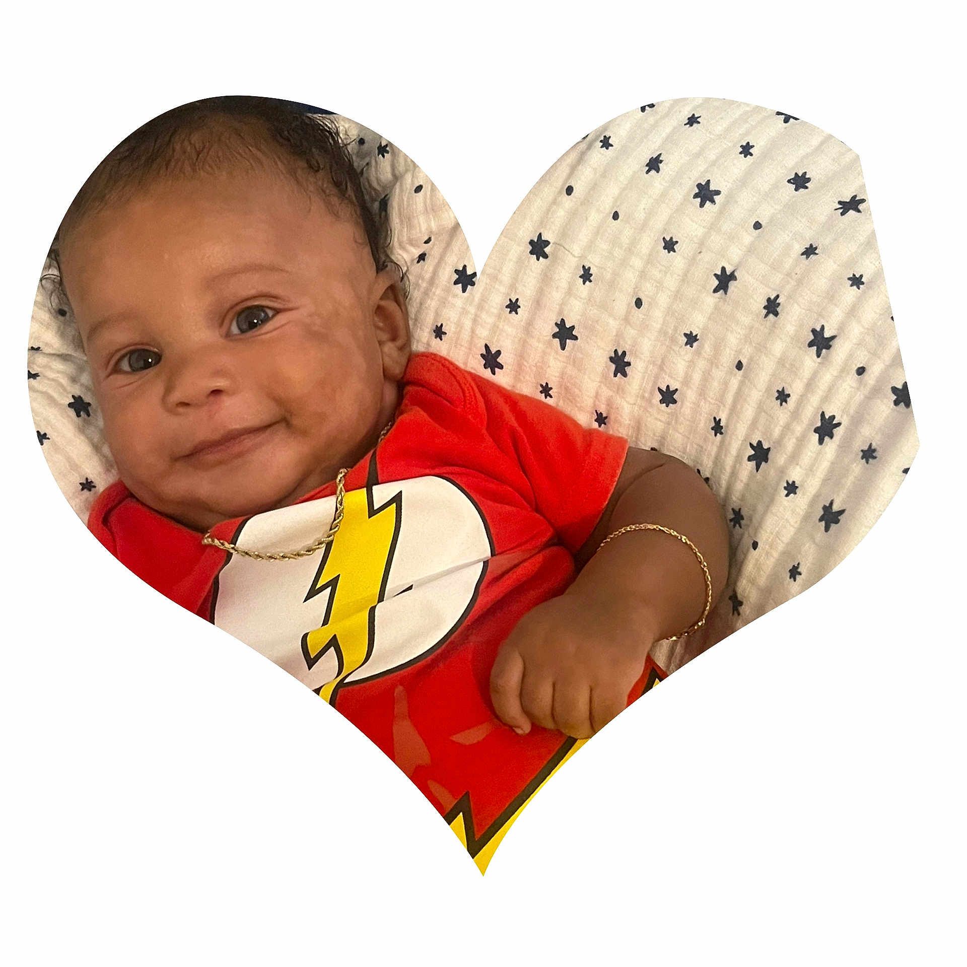 Elohim joined the competition — help win amazing prizes! baby, blanket, bracelet, chain_necklace, child, closeup, cute, face, happy, heart_shape, indoors, infant, lightning_bolt, lying_down, person, portrait, red_shirt, skin, smiling, star_pattern