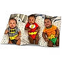 Elohim joined the competition — help win amazing prizes! aquaman, baby, baby_boy, batman, blanket, chain_necklace, child, clothing, crib, cute, flash, happy, indoor, infant, lying_down, photography, portrait, smiling, star_pattern, superhero_costume