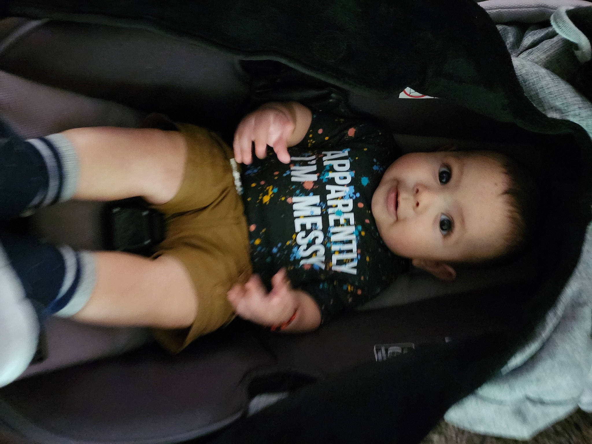 Ace is registered to the contest to win money with this photo: auto_part, baby, baby_carriage, baby_in_car_seat, baby_products, baby_toddler_clothing, car_seat, child, comfort, fun, gesture, lap, nail, person, sitting, steering_wheel, thigh, thumb, toddler, vehicle_door