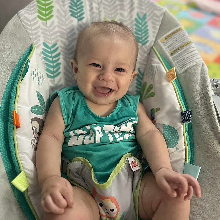 Sterling joined the competition — help win amazing prizes! baby, chair, clothing, crib, cushion, cutlery, face, furniture, happy, head, homedecor, infantbed, laughing, person, photography, portrait, shorts, sitting, smile, t_shirt