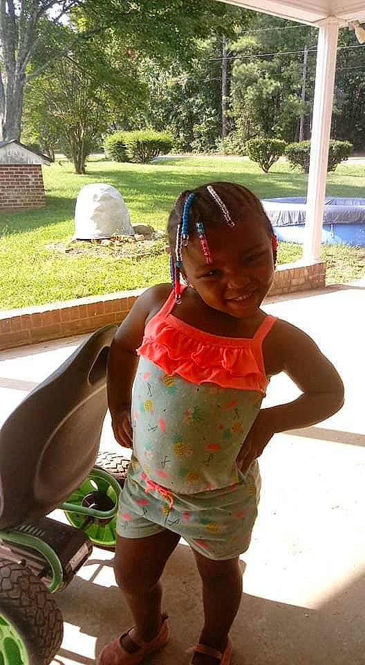 Azariah is registered to the contest to win money with this photo: adaptation, child, fun, grass, headwear, joy, leisure, neck, person, plant, play, summer, toddler, tree, vacation