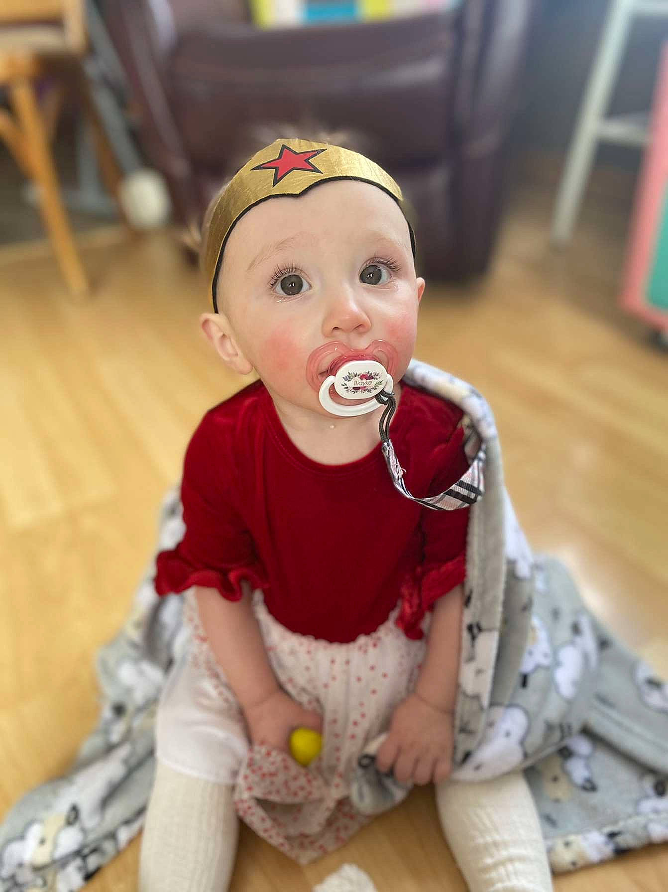 Blayke joined the competition — help win amazing prizes! baby, baby_toddler_clothing, chair, cheek, child, floor, flooring, fun, happy, head, headgear, headwear, iris, person, sitting, skin, sleeve, sock, surprise, thigh