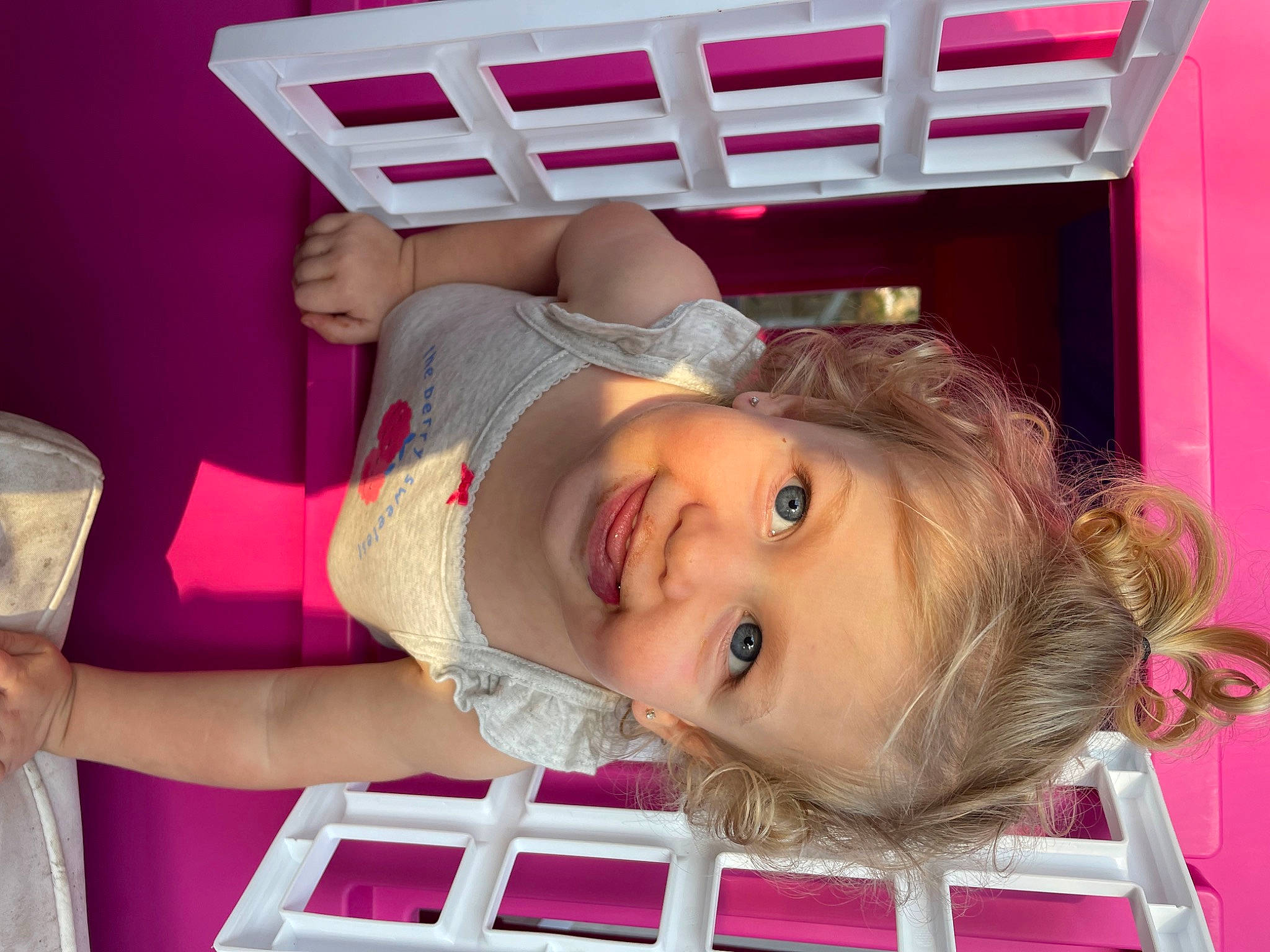 Kinsley is registered to the contest to win money with this photo: baby, baby_toddler_clothing, cheek, child, eyelash, fun, happy, hat, joy, magenta, party, person, pink, red, room, skin, smile, toddler, white