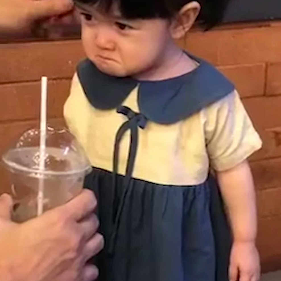 Dorothy is registered to the contest to win money with this photo: blue_dress, brick_wall, child, cute, dress, expression, grumpy_face, hair, hand, indoors, person, plastic_cup, portrait, pout, refusal, short_sleeves, straw, toddler, yellow_top, young_child