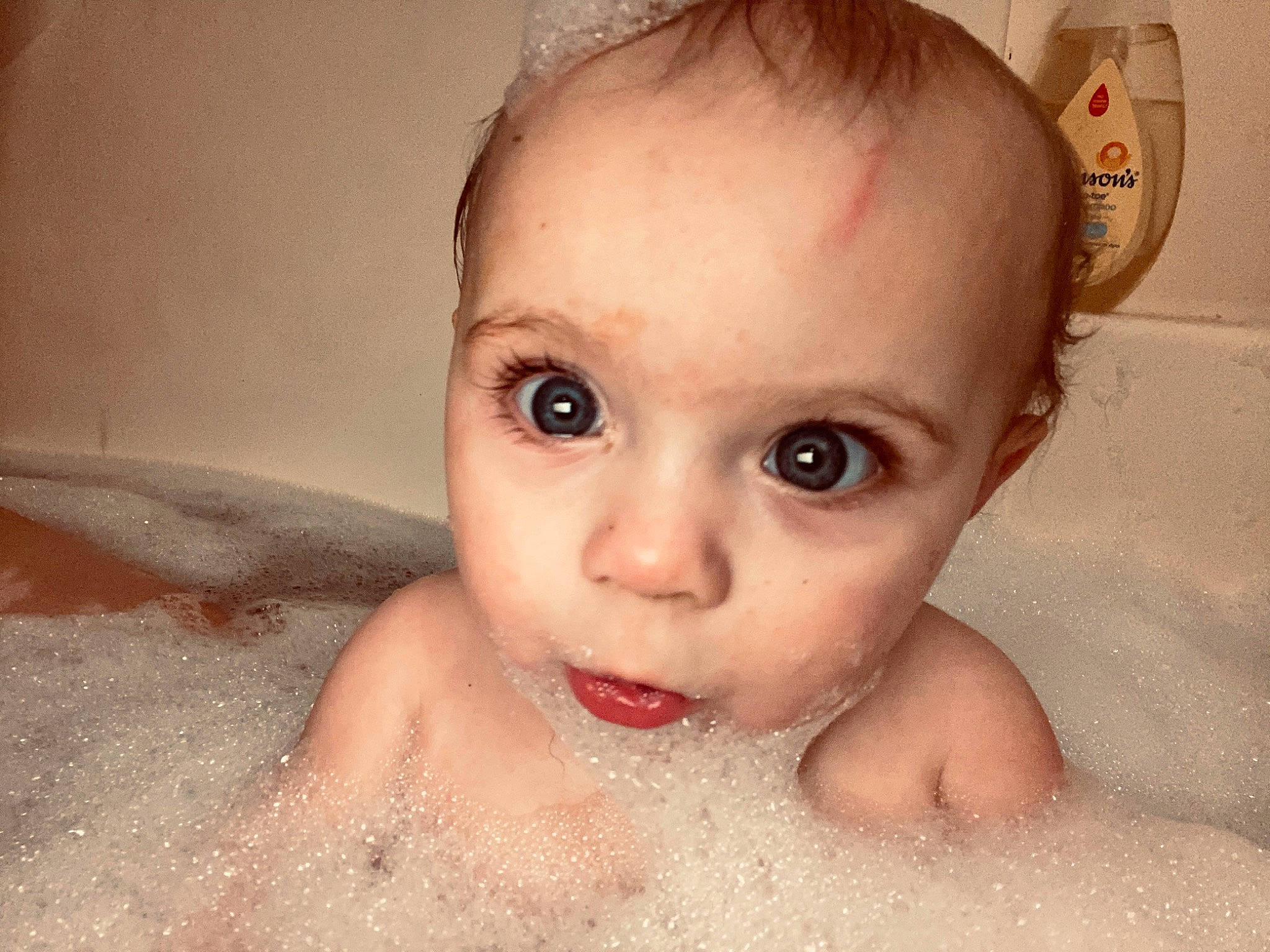 Daenerys is registered to the contest to win money with this photo: baby, baby_bathing, baby_making_funny_faces, bathing, bathtub, beauty, cheek, child, chin, eye, eyebrow, face, facial_expression, forehead, hair, head, lip, nose, person, skin