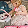 accessories, baby, bag, balloon, bodypart, child, clothing, dress, face, female, finger, girl, hand, handbag, head, openingpresent, person, photography, portrait, purse