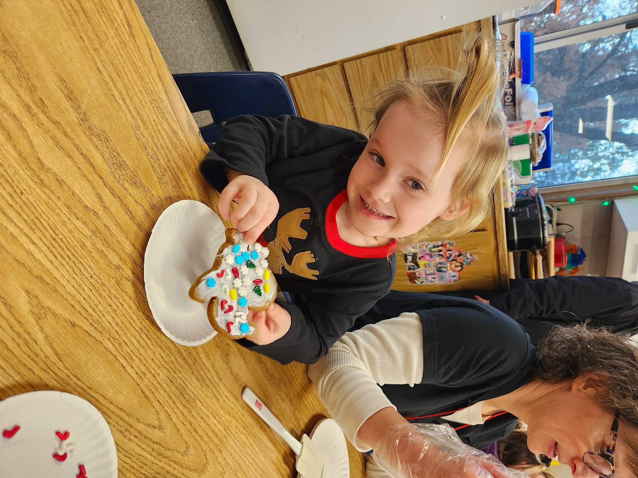 Dahlia is registered to the contest to win money with this photo: baby, baby_playing_with_toys, baby_toddler_clothing, chair, child, comfort_food, fun, happy, joy, leisure, person, play, room, sitting, smile, sweetness, t_shirt, table, tableware, toddler