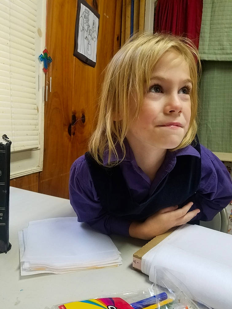 Charleigh is registered to the contest to win money with this photo: blond, child, homework, learning, person