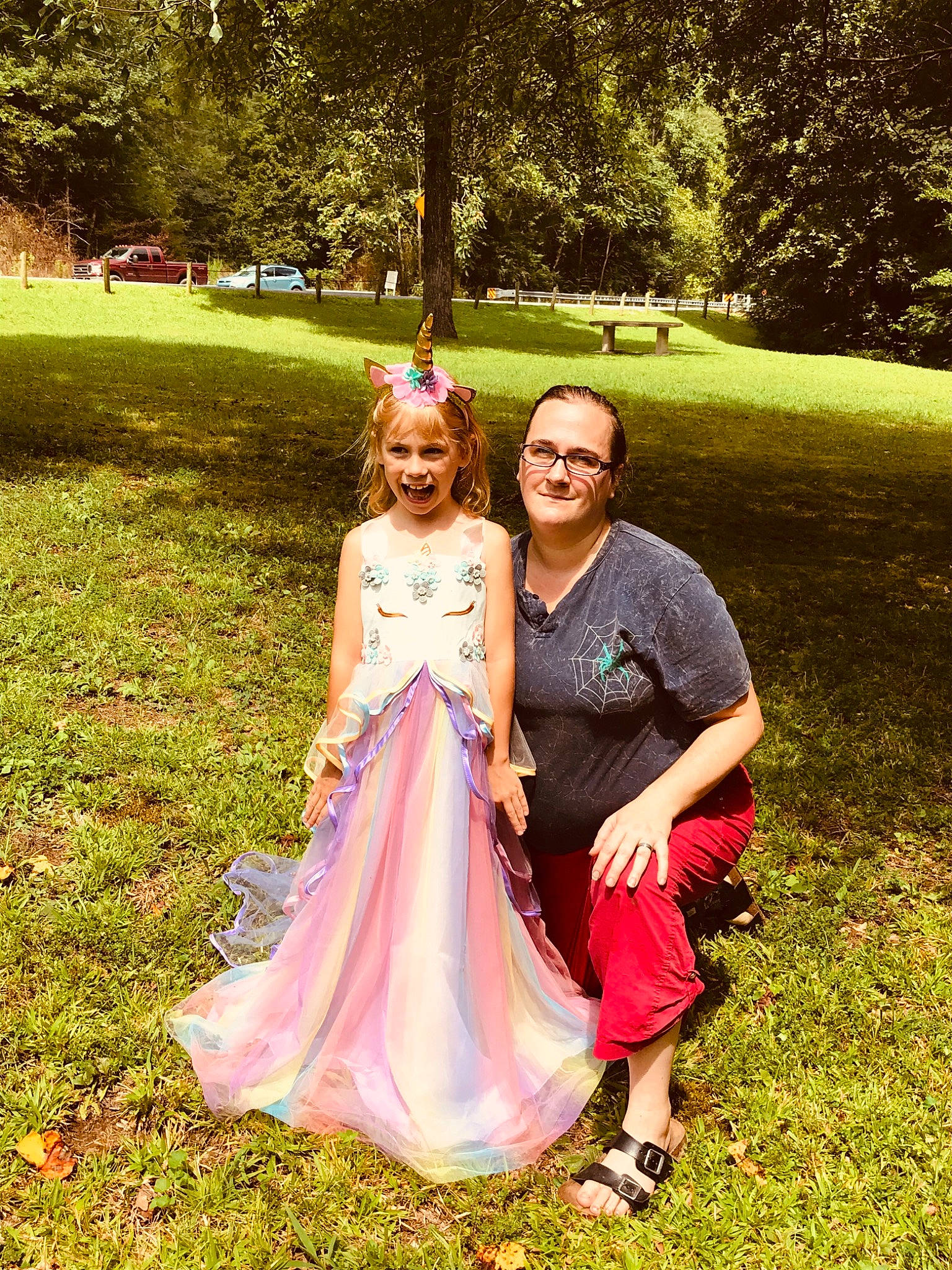 Charleigh is registered to the contest to win money with this photo: botany, ceremony, child, dress, event, formal_wear, gown, grass, green, happy, joy, leaf, people, people_in_nature, person, photograph, photography, pink, smile, spring