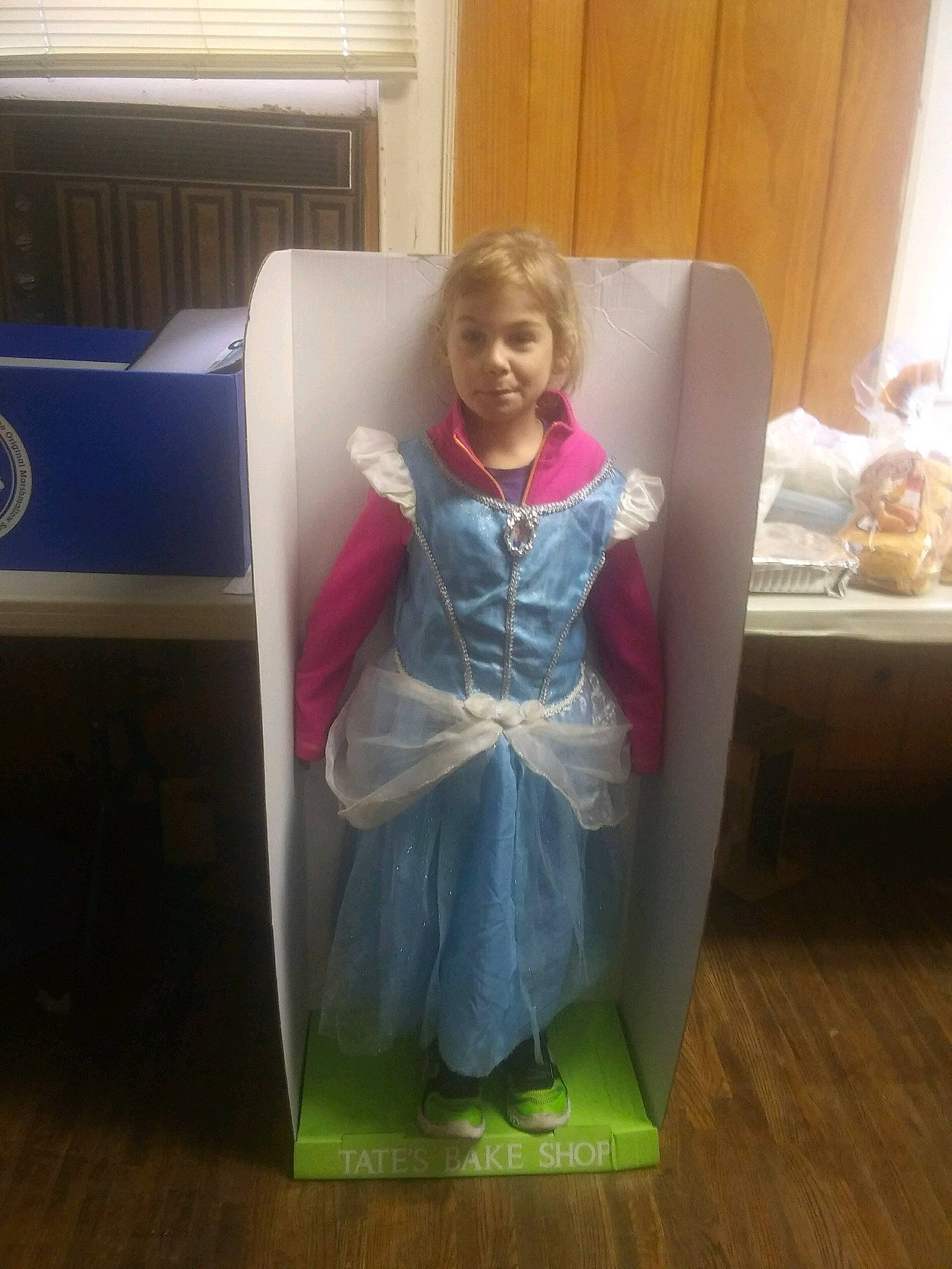 Charleigh joined the competition — help win amazing prizes! comfort, curtain, dress, floor, flooring, formal_wear, hardwood, human_leg, knee, leg, magenta, person, plastic, room, sitting, sleeve, tableware, toddler, varnish, wood