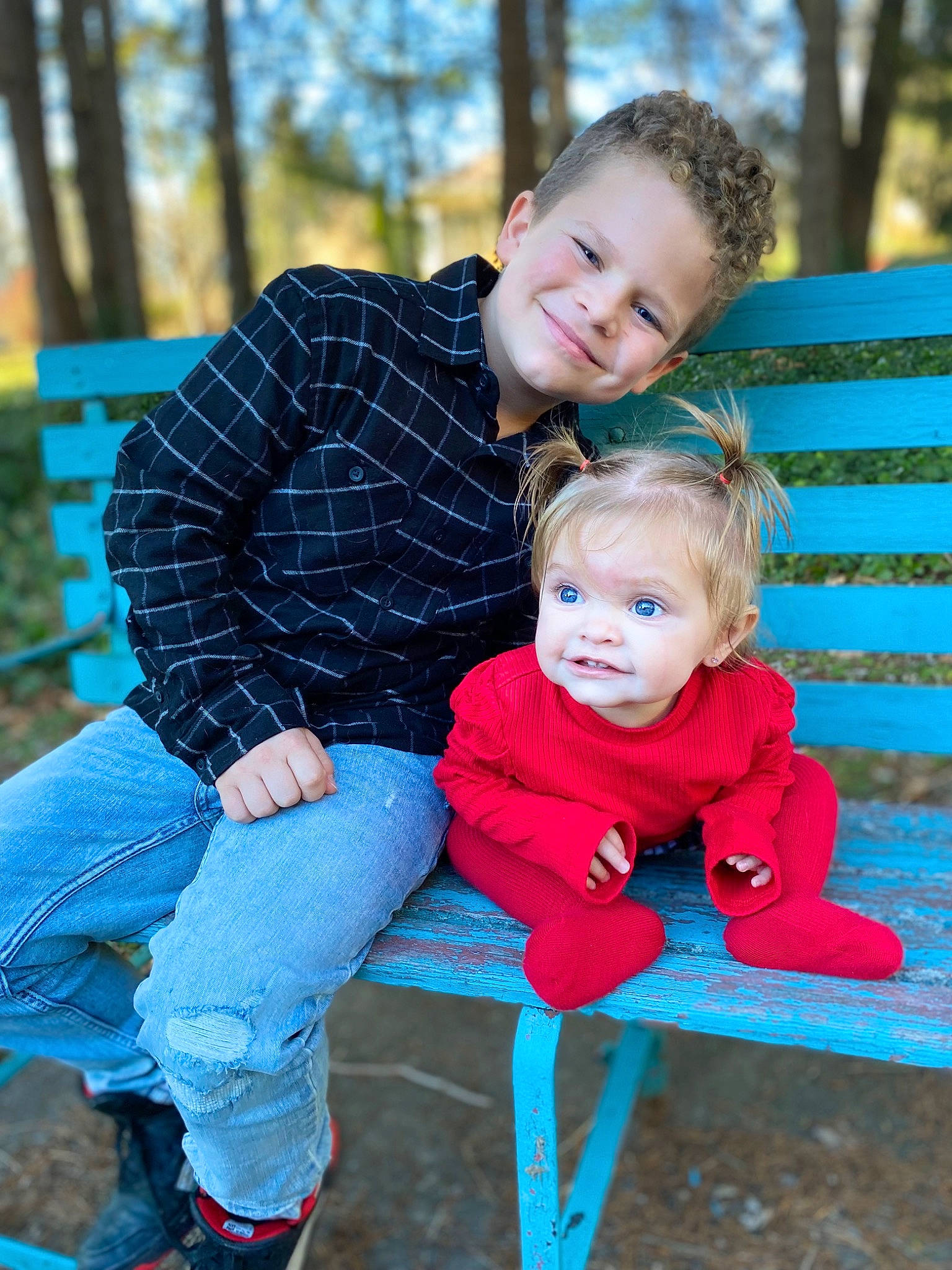 Payton is registered to the contest to win money with this photo: baby_toddler_clothing, blue, child, eye, facial_expression, fun, grass, green, happy, head, jeans, joy, leisure, people_in_nature, person, photograph, recreation, red, smile, tartan