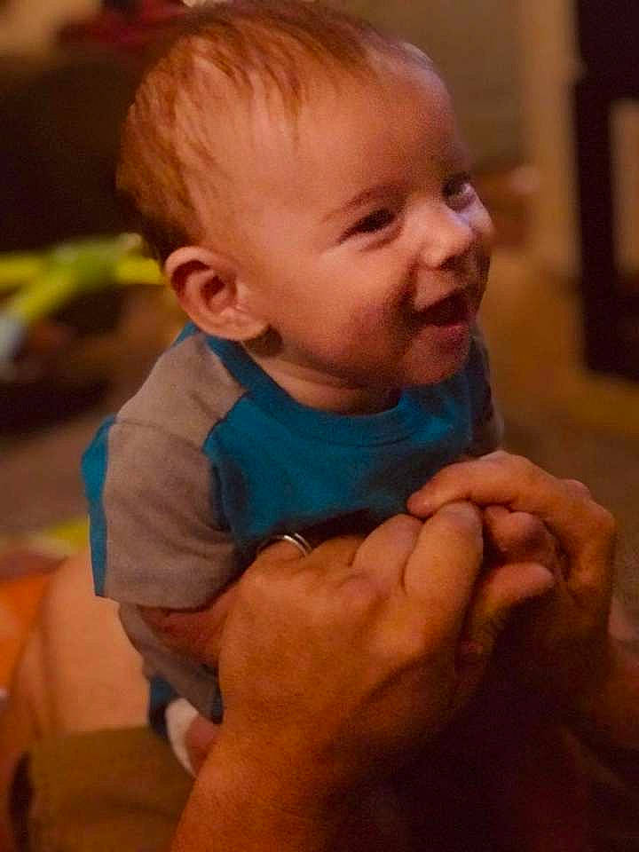 Langston is registered to the contest to win money with this photo: baby, cheek, child, chin, ear, face, facial_expression, finger, hand, head, mouth, neck, nose, person, skin, smile, thumb, toddler