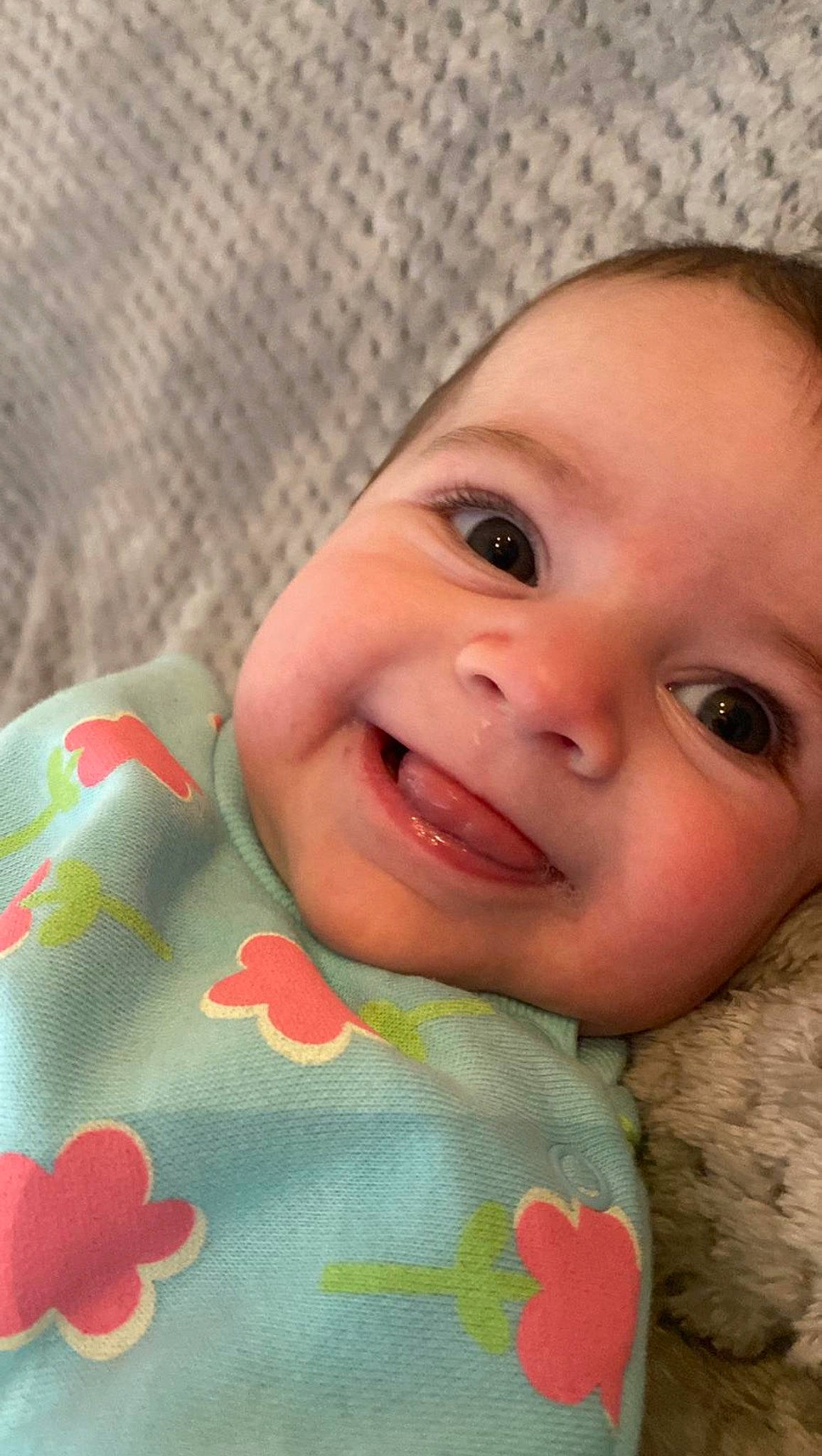 Aoife is registered to the contest to win money with this photo: baby, baby_toddler_clothing, cheek, chin, eye, forehead, hair, happy, head, iris, joy, lip, mouth, nose, organ, person, pink, skin, sleeve, smile