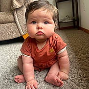 Iyla is registered to the contest to win money with this photo: baby, child, infant, carpet, floor, indoor, furniture, chair, table, clothing, person, cute, expression, sitting, skin, hand, foot, hair, room, window