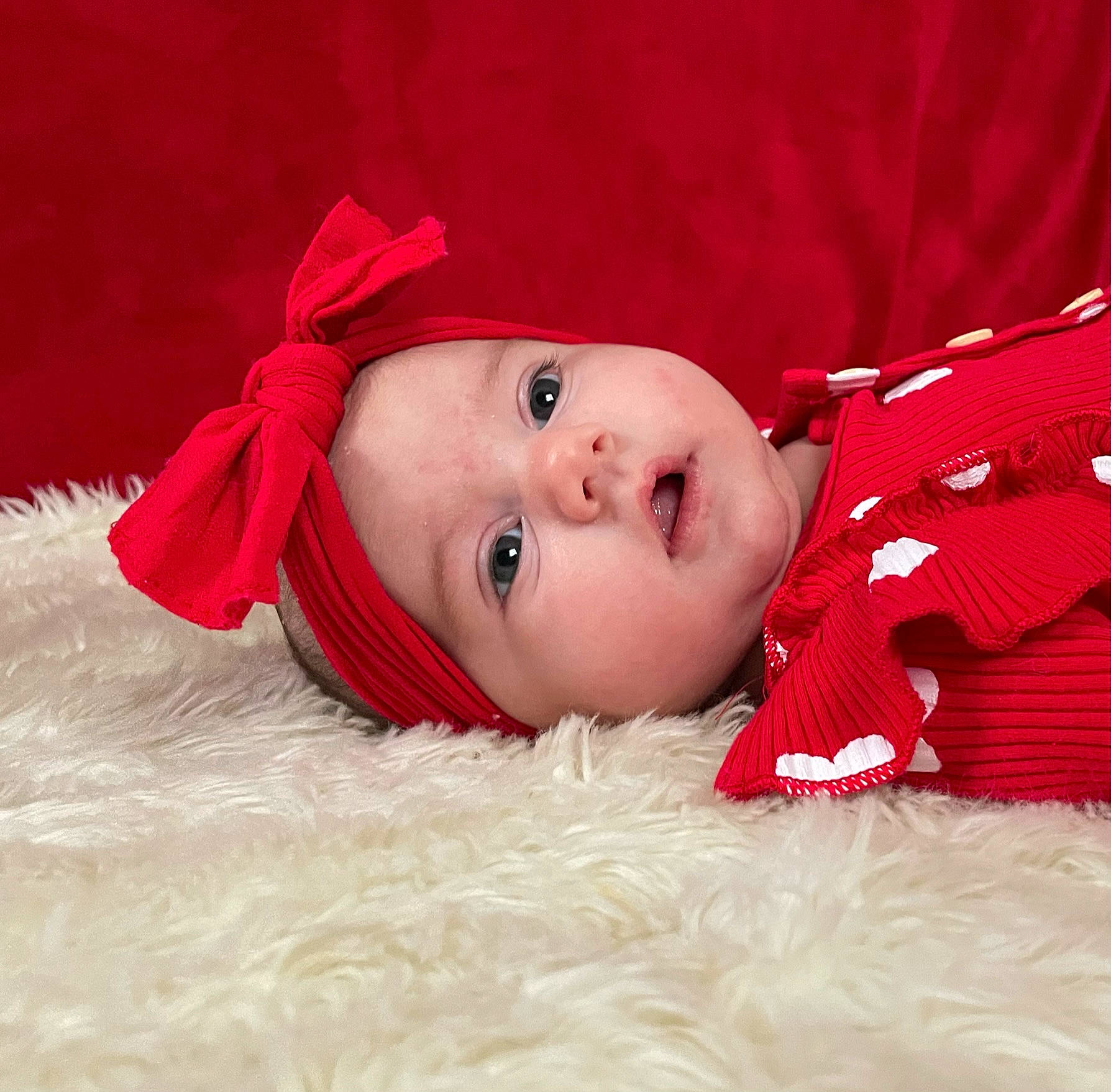 Laurel joined the competition — help win amazing prizes! baby, baby_toddler_clothing, carmine, child, comfort, eye, eyebrow, flash_photography, fur, grass, headwear, lip, magenta, no_expression, pattern, person, portrait_photography, skin, sleeve, toddler