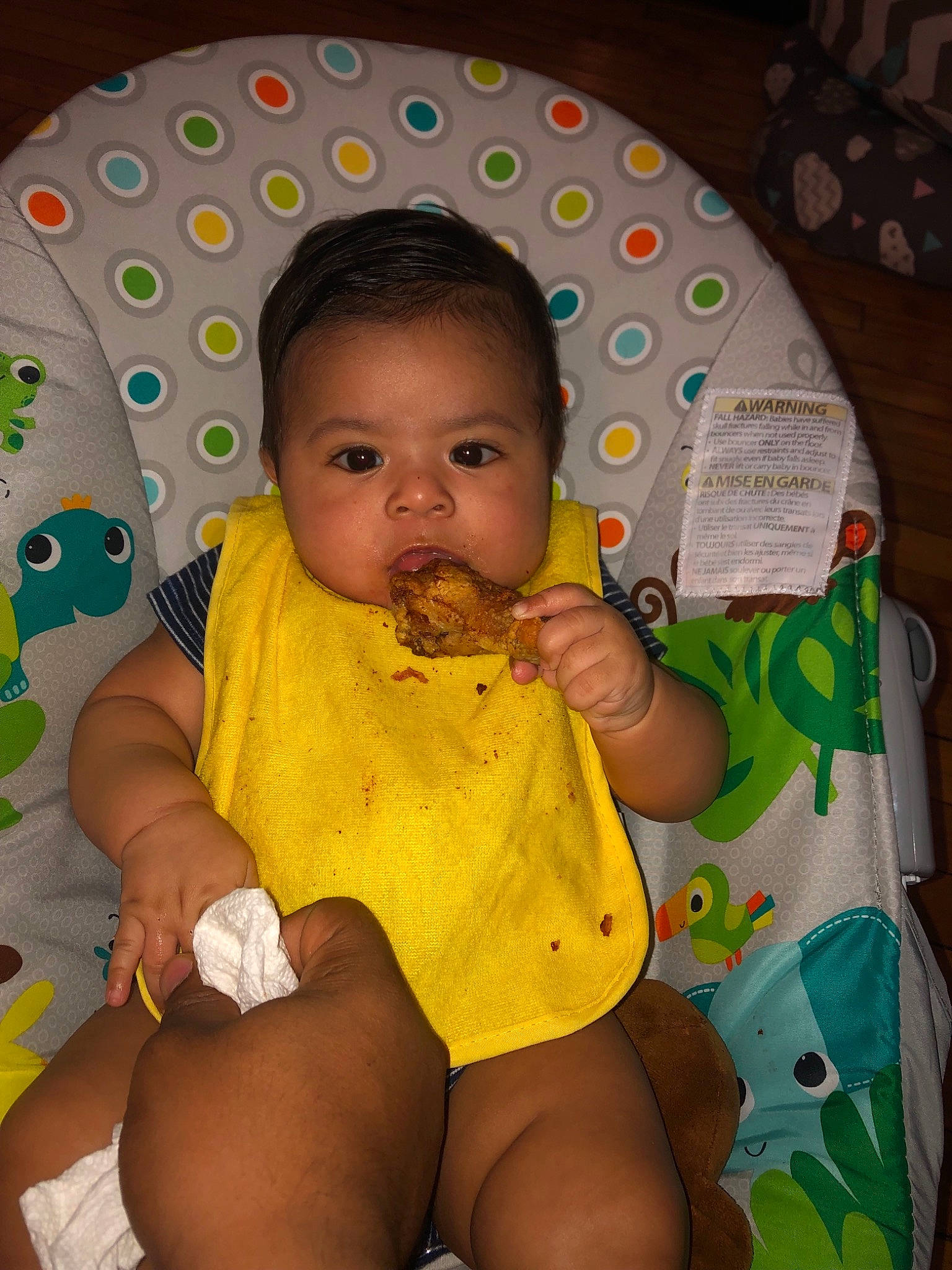 Jesiah is registered to the contest to win money with this photo: baby, cheek, child, eating, eye, iris, joy, person, play, sitting, thigh, toddler, under_exposed, yellow