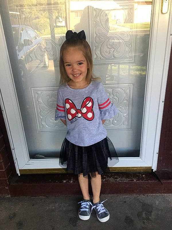 Kairi is registered to the contest to win money with this photo: child, child_model, costume, footwear, joy, person, shoe, smile, snapshot, standing, t_shirt, toddler