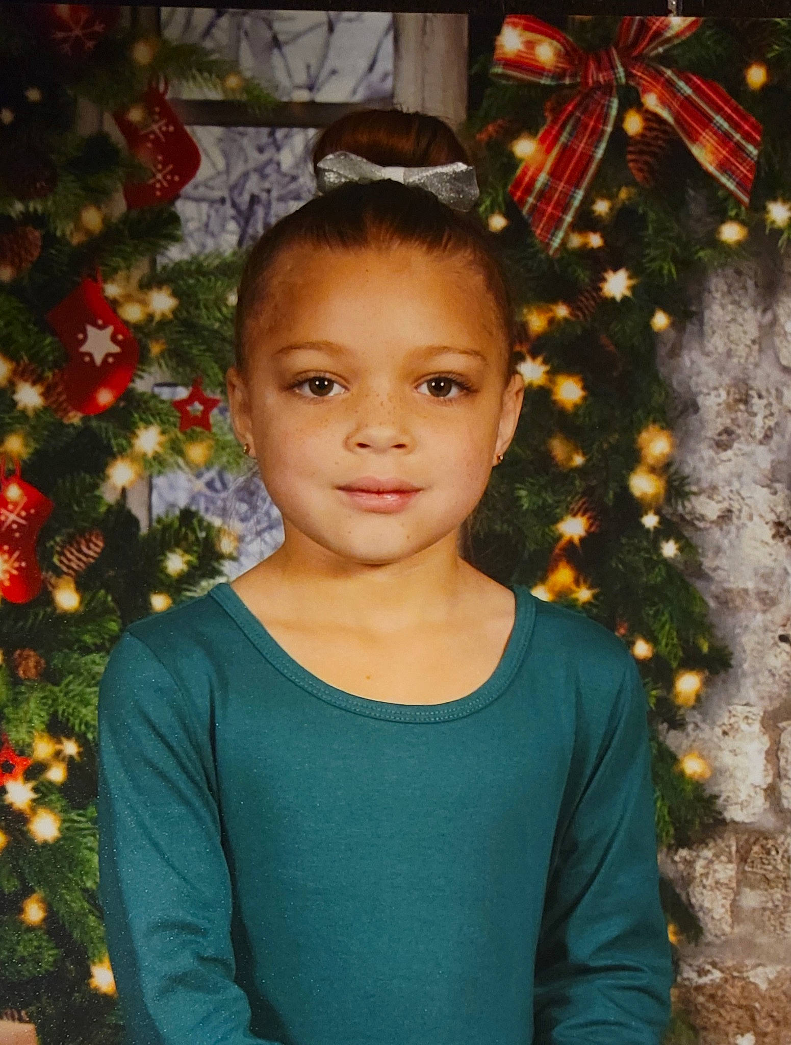 Malaysia is registered to the contest to win money with this photo: beauty, chin, christmas_decoration, christmas_ornament, christmas_tree, evergreen, happy, holiday_ornament, iris, joy, leaf, neck, ornament, person, plant, red, sleeve, smile, standing, tree