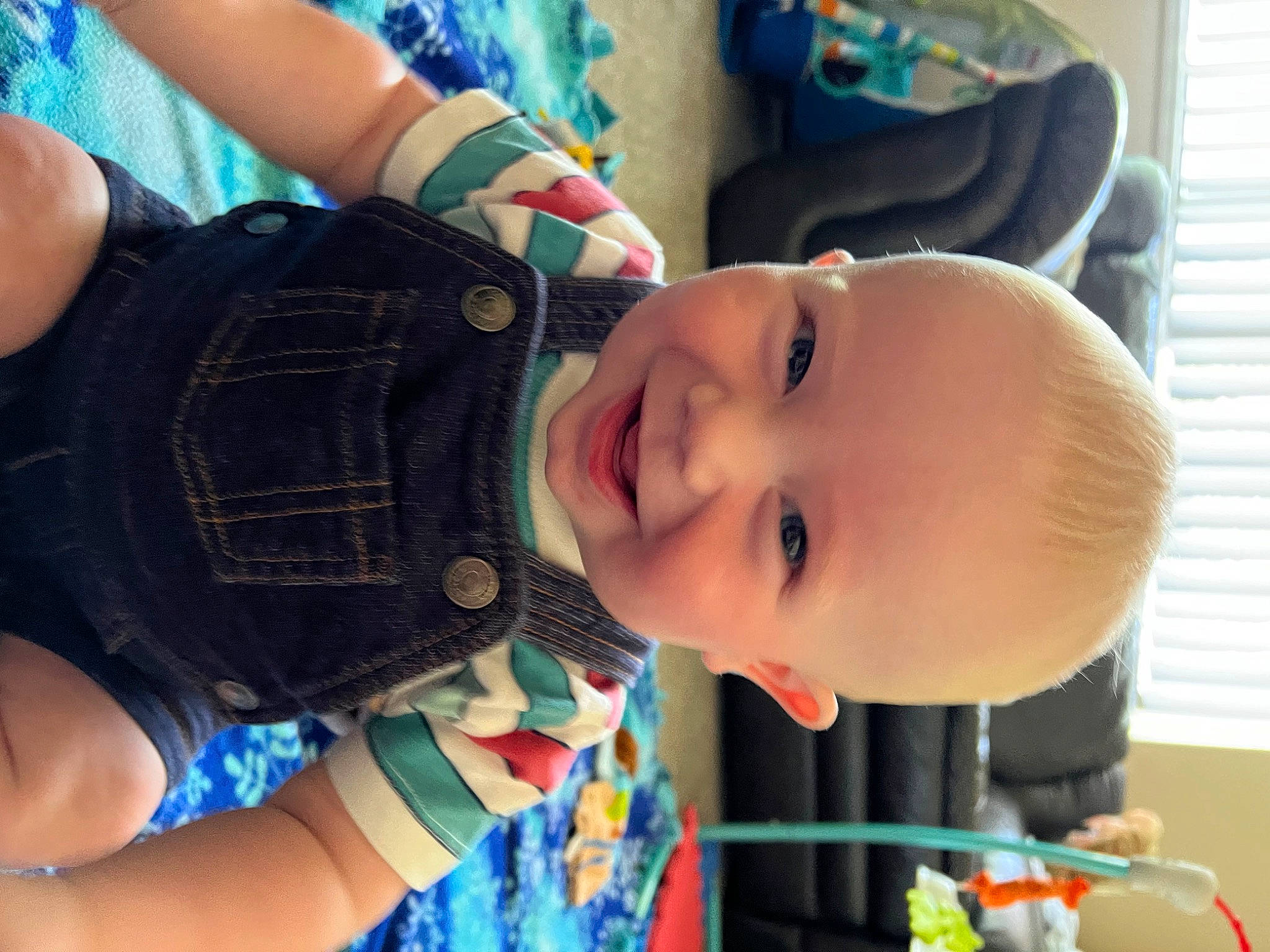 Evander joined the competition — help win amazing prizes! baby, baby_toddler_clothing, blue, cheek, child, cool, eye, finger, gesture, hand, happy, head, human_body, joy, lip, mouth, nose, person, plant, skin