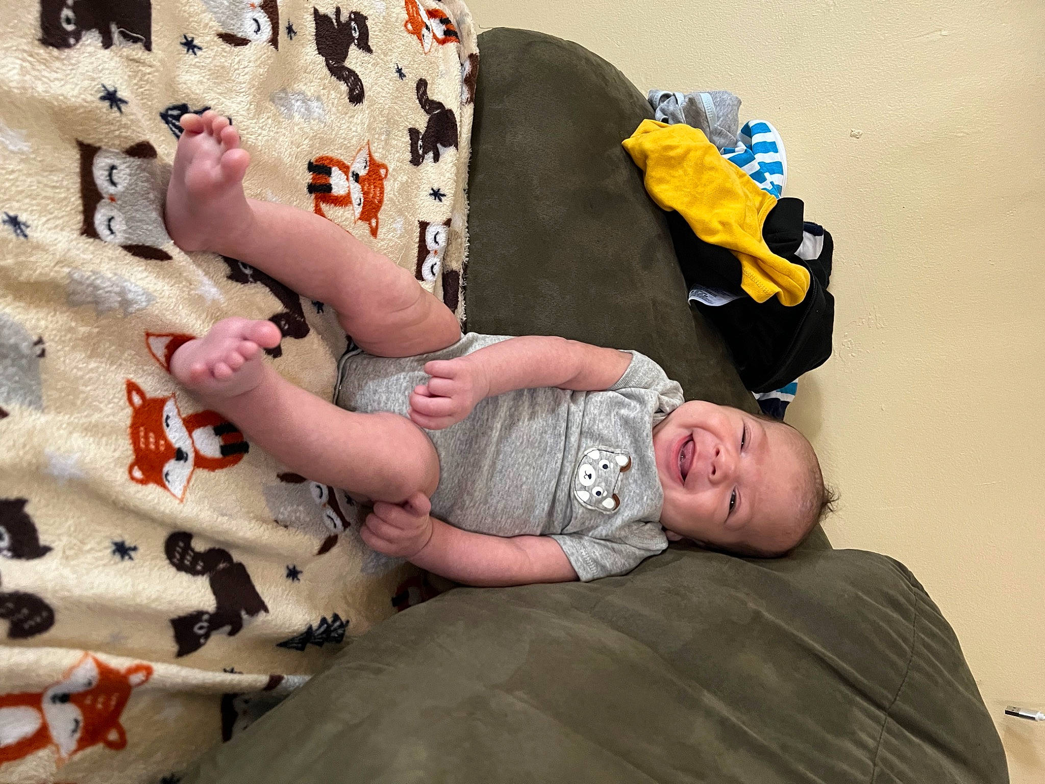 Princeton is registered to the contest to win money with this photo: arm, baby, baby_products, baby_sleeping, baby_toddler_clothing, bed, bedding, child, comfort, fun, happy, linens, pattern, person, room, sitting, sleeve, t_shirt, thigh, toddler