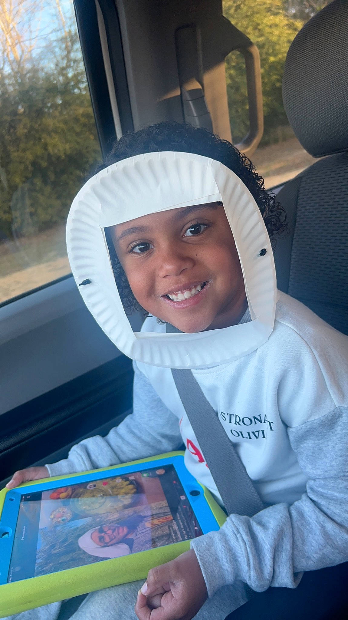 Olivia joined the competition — help win amazing prizes! auto_part, automotive_exterior, automotive_wheel_system, car_seat, car_seat_cover, child, electric_blue, family_car, fun, happy, headwear, joy, motor_vehicle, person, product, smile, steering_wheel, t_shirt, toddler, tree