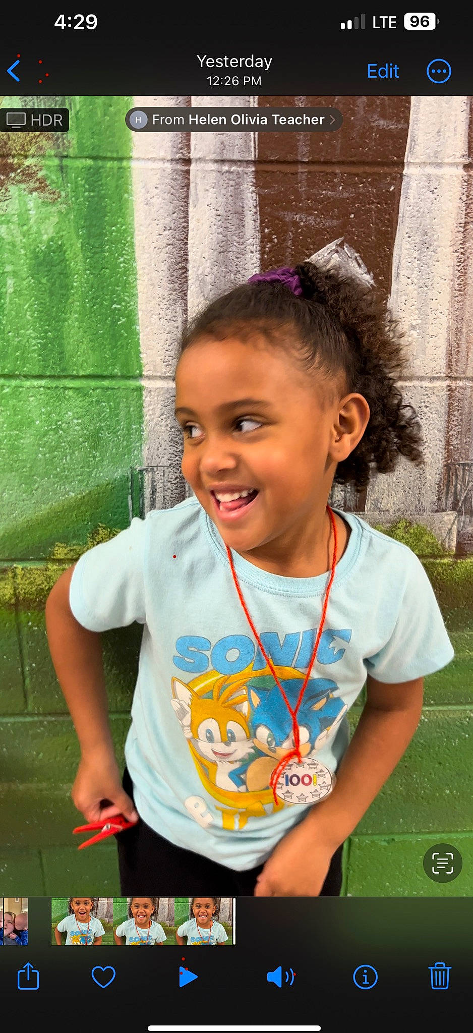 Olivia is registered to the contest to win money with this photo: adaptation, beauty, black_hair, chin, cool, face, facial_expression, forehead, fun, grass, hairstyle, happy, headwear, human, joy, leisure, person, plant, skin, sleeve