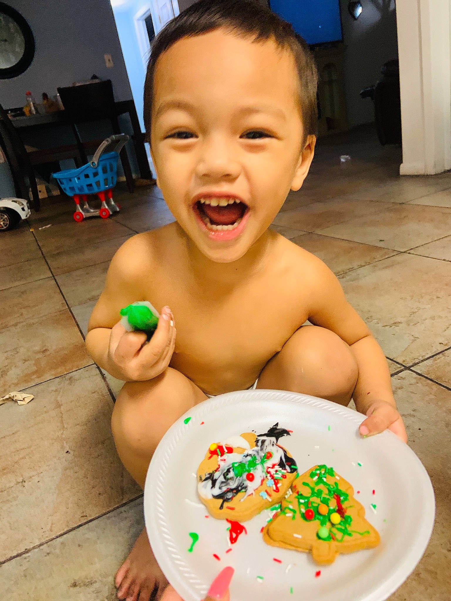 Tony Jr is registered to the contest to win money with this photo: baby, bathing, candy, chest, child, comfort_food, dishware, food, fun, happy, ingredient, leisure, mechanical_fan, person, plate, recipe, smile, table, tableware, thumb