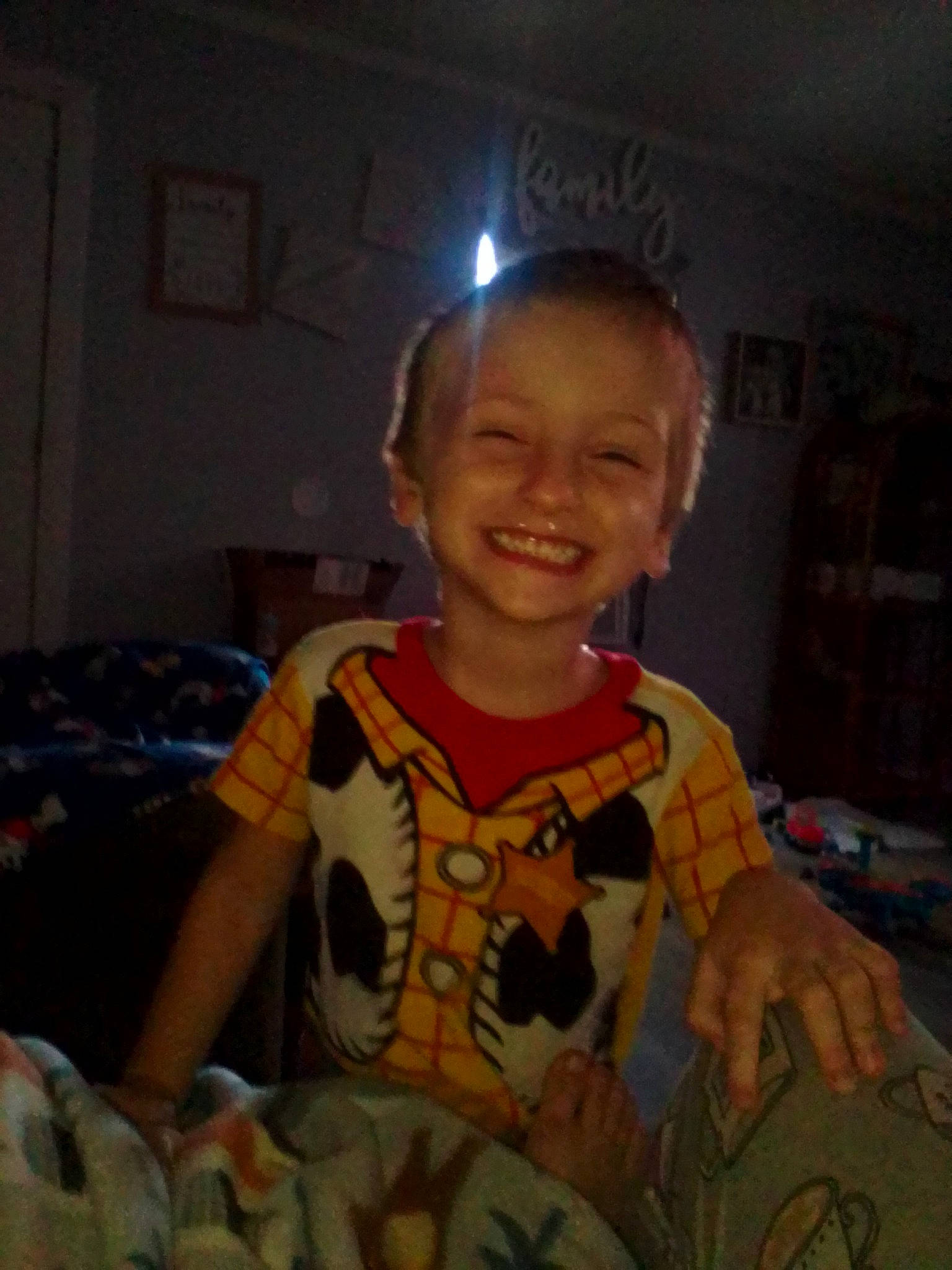 Liam is registered to the contest to win money with this photo: baby, baby_toddler_clothing, child, cool, finger, flooring, forehead, fun, hand, happy, head, joy, linens, pattern, person, room, sitting, sleeve, smile, t_shirt