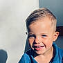 Nolan a rejoint le concours — aidez-le/la à gagner de superbes lots ! child, boy, smiling, blue_eyes, short_hair, polo_shirt, indoor, sunlight, shadow, portrait, happy, cute, face, casual_clothing, light_and_shadow, young, skin, human, head, closeup