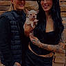 Gucci joined the competition — help win amazing prizes! women, people, puppy, dog, french_bulldog, smiling, portrait, standing, brick_wall, outdoor, tattoos, red_cap, black_clothing, fashion, pet, holding, animal, companions, photography, vertical_photo