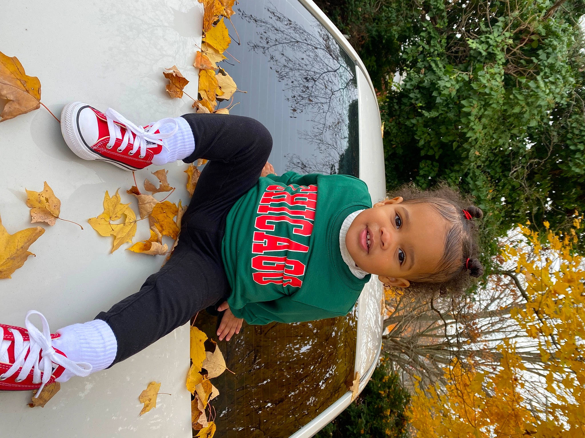 Xolani is registered to the contest to win money with this photo: child, event, fun, gesture, grass, happy, leisure, pattern, people_in_nature, person, plant, sleeve, soil, t_shirt, toddler, travel, tree, water