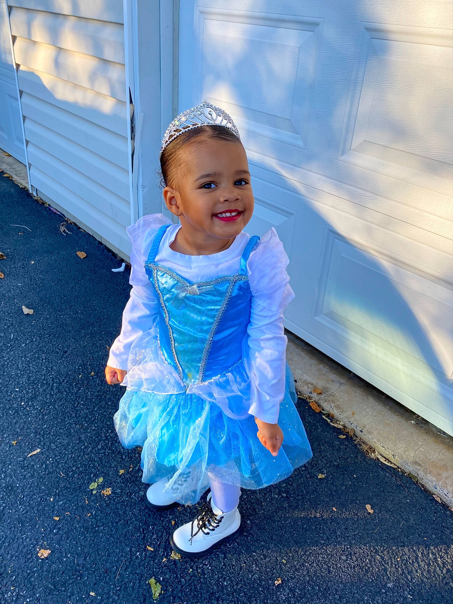 Xolani is registered to the contest to win money with this photo: asphalt, baby_toddler_clothing, blue, child, cloud, electric_blue, fashion_accessory, flash_photography, fun, grass, happy, hat, joy, leisure, magenta, person, sandal, sky, smile, standing