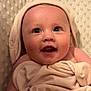 baby, infant, smiling, wrapped, towel, hooded_towel, blanket, soft_texture, closeup, face, happy, child, skin, cute, newborn, indoors, portrait, expression, warm, cozy