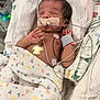 newborn, baby, hospital, incubator, medical_tubes, blanket, heart_pattern, sleeping, monitor, electrodes, infant, patient, healthcare, fragile, swaddled, cute, child, resting, medical_care, neonatal