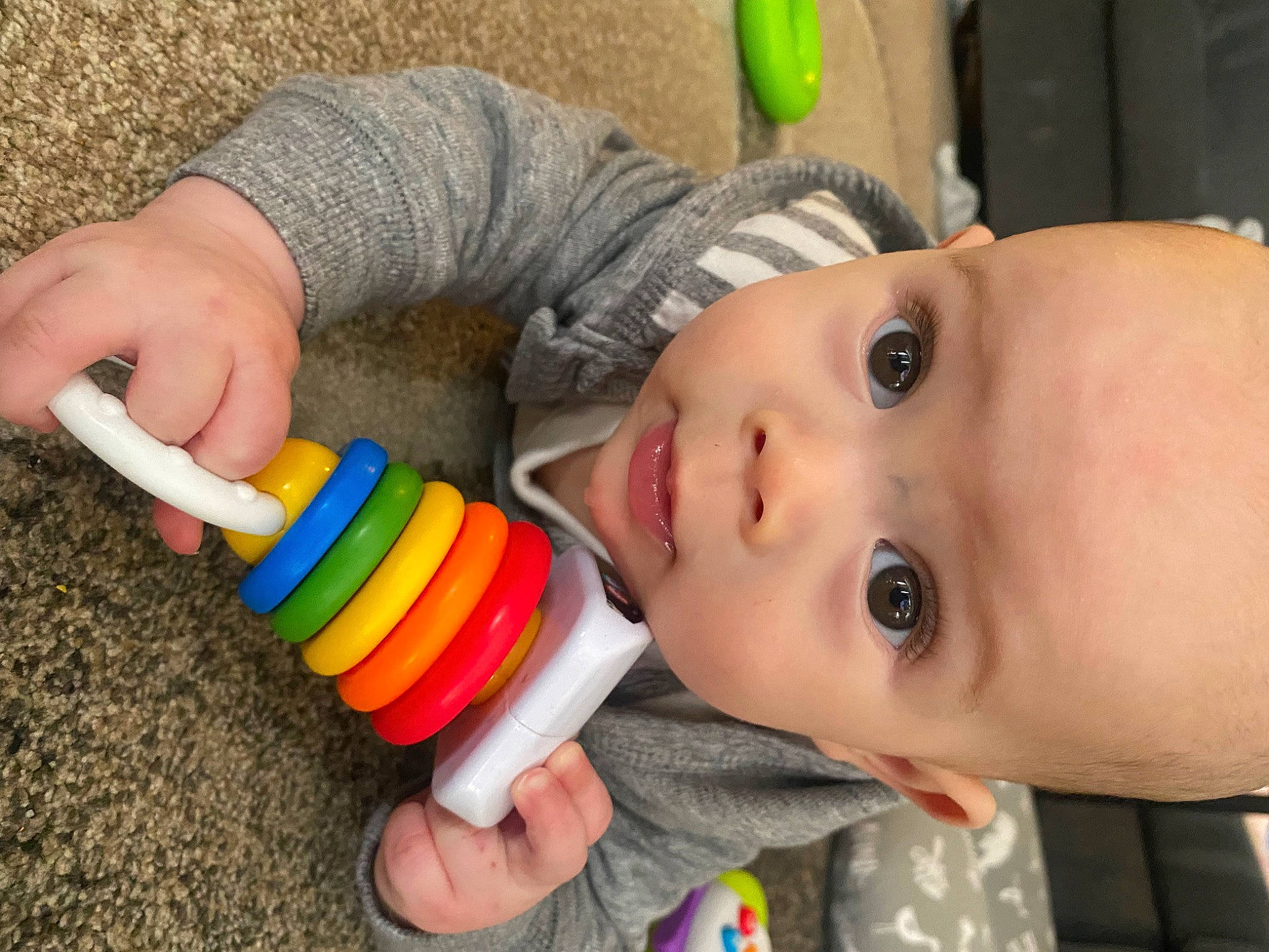 Koa is registered to the contest to win money with this photo: baby, baby_playing_with_toys, baby_products, baby_toddler_clothing, baby_toys, cheek, child, drinkware, eyelash, finger, fun, happy, nail, nose, person, play, skin, thumb, toddler, toy