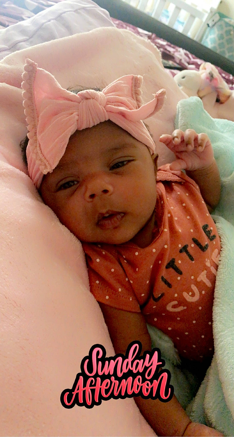 Meilani is registered to the contest to win money with this photo: baby, baby_toddler_clothing, cheek, comfort, eye, eyebrow, eyelash, facial_expression, finger, gesture, happy, headwear, human_body, lip, mouth, nose, person, pink, skin, smile