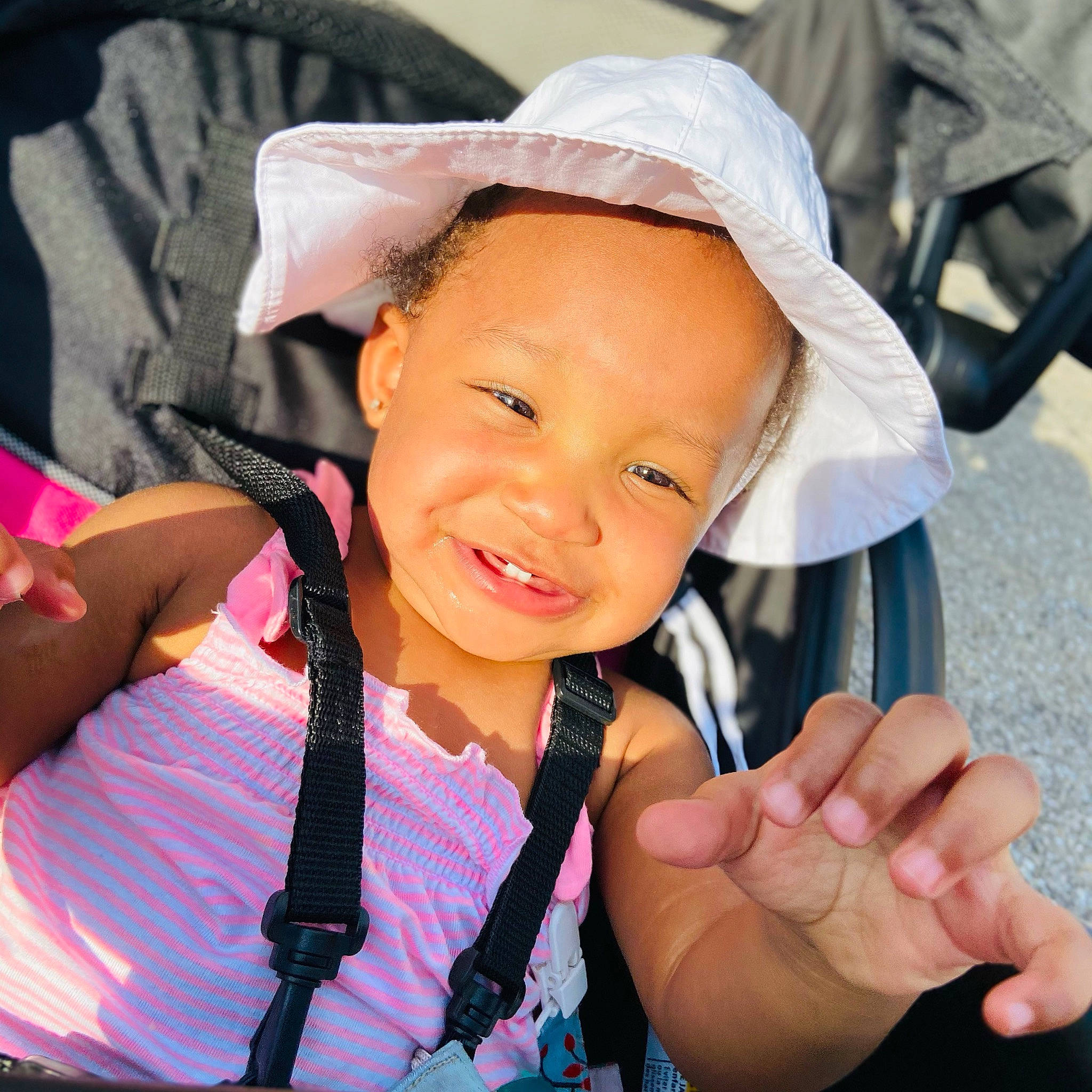 Alaura joined the competition — help win amazing prizes! baby_carriage, baby_products, child, cool, electric_blue, eye, fashion_accessory, finger, fun, gesture, hand, happy, joy, lip, nail, person, pink, product, skin, smile