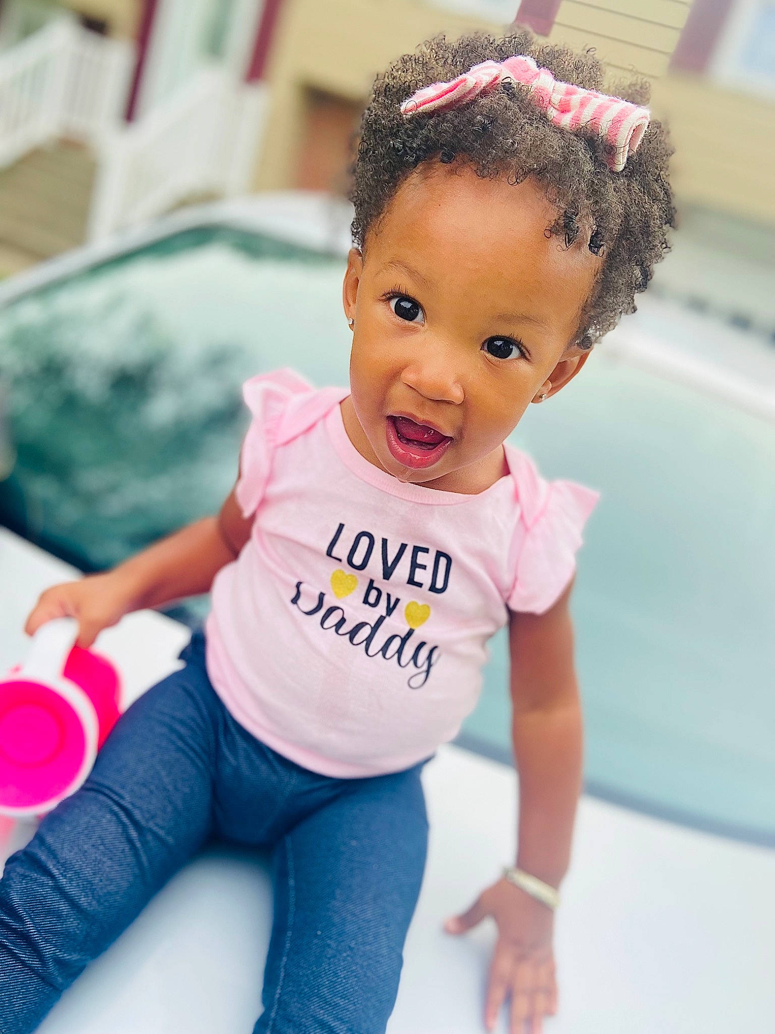 Alaura is registered to the contest to win money with this photo: baby_toddler_clothing, child, eyelash, facial_expression, fun, hair, hairstyle, happy, head, human_body, leisure, person, pink, product, skin, sleeve, smile, surprise, t_shirt, thigh