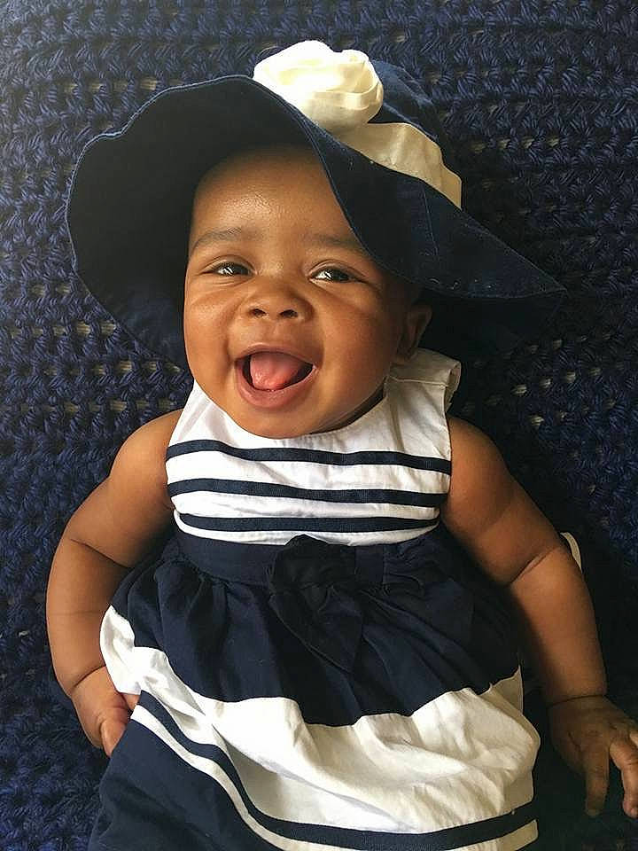 Lexi Phillips is registered to the contest to win money with this photo: baby, baby_toddler_clothing, beauty, black, child, dress, fashion_accessory, finger, flash_photography, fun, gesture, happy, hat, headgear, lip, person, pink, sleeve, smile, sun_hat