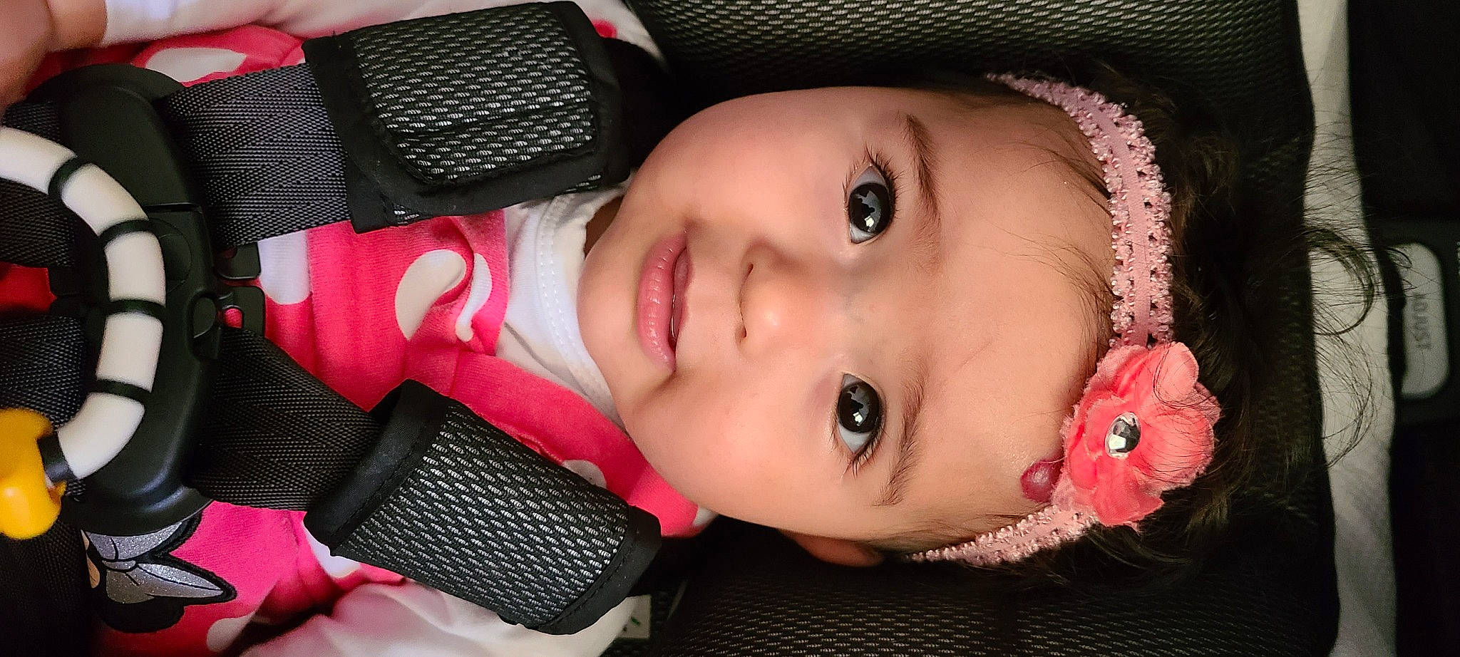 Samantha is registered to the contest to win money with this photo: baby_toddler_clothing, cheek, chin, eye, eyebrow, eyelash, facial_expression, hairstyle, head, headwear, human, human_body, lip, mouth, neck, nose, organ, outerwear, person, product