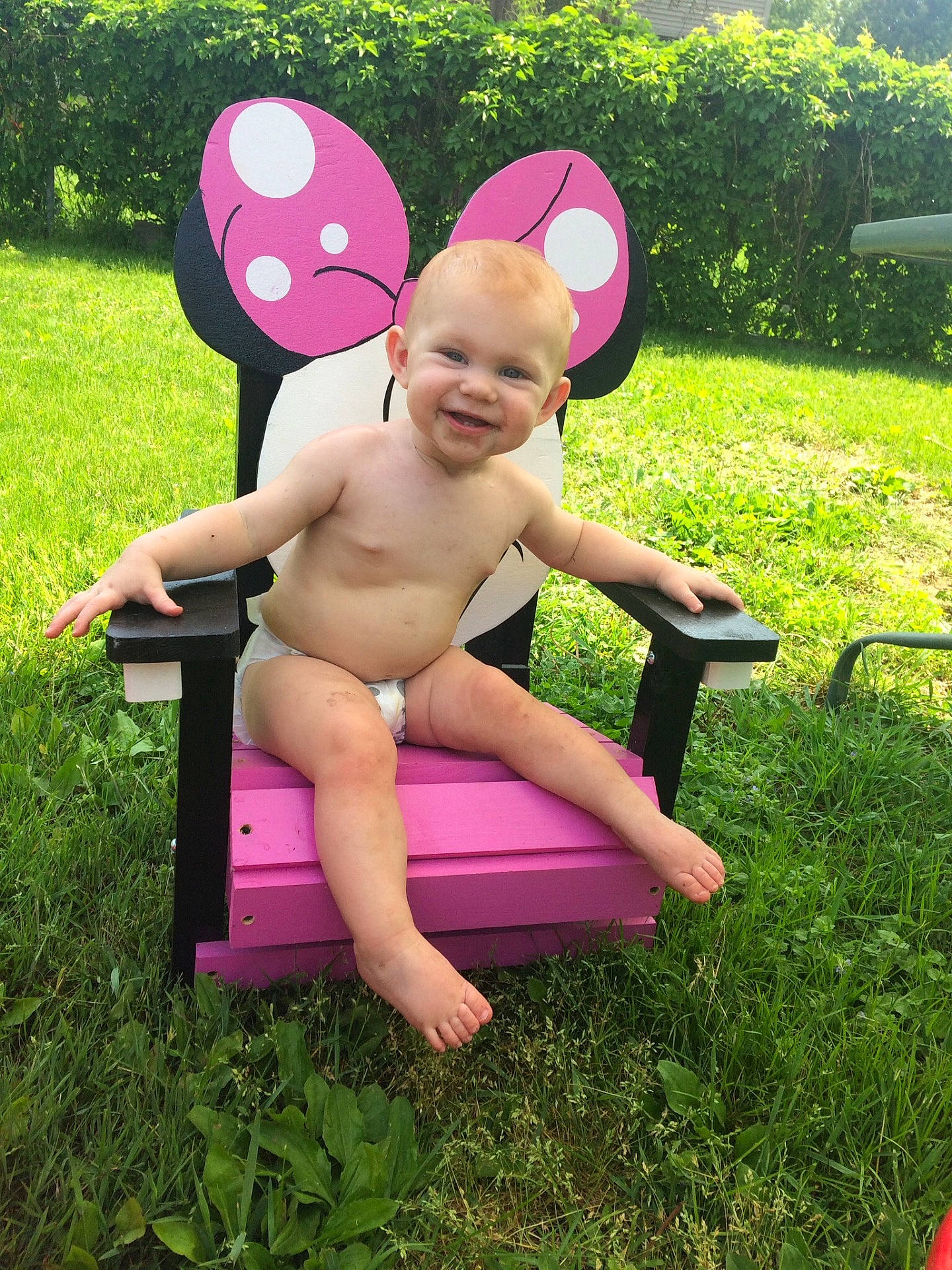 Morgan joined the competition — help win amazing prizes! child, fun, girl, grass, happiness, infant, joy, lawn, leg, leisure, meadow, outdoor_play_equipment, person, pink, plant, play, sitting, smile, summer, toddler