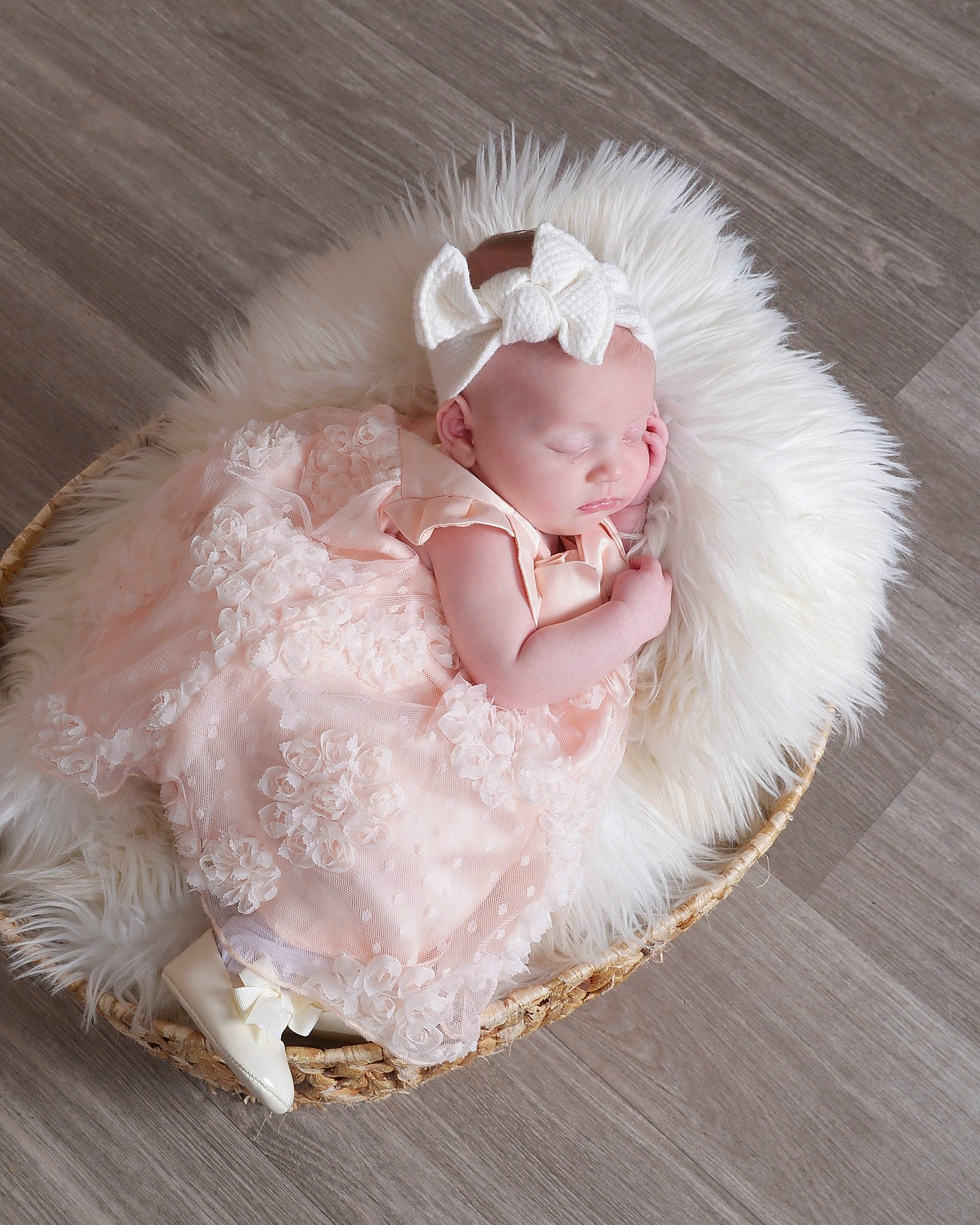 Estella is registered to the contest to win money with this photo: baby, baby_toddler_clothing, bridal_accessory, child, dress, embellishment, event, fashion_accessory, flash_photography, flooring, fur, hair_accessory, happy, headband, headpiece, jewellery, linens, natural_material, peach, person