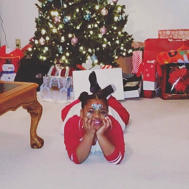 Heaven is registered to the contest to win money with this photo: christmas, christmas_decoration, christmas_eve, christmas_tree, event, fictional_character, fun, holiday, joy, lap, leg, person, plant, santa_claus, sitting, table, thigh