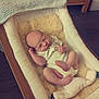Tristan joined the competition — help win amazing prizes! baby, newborn, sleeping, infant, lounger, blanket, wooden_floor, wooden_cabinet, soft, cozy, indoors, cute, peaceful, child, pale_skin, onesie, footwear, head, face, resting