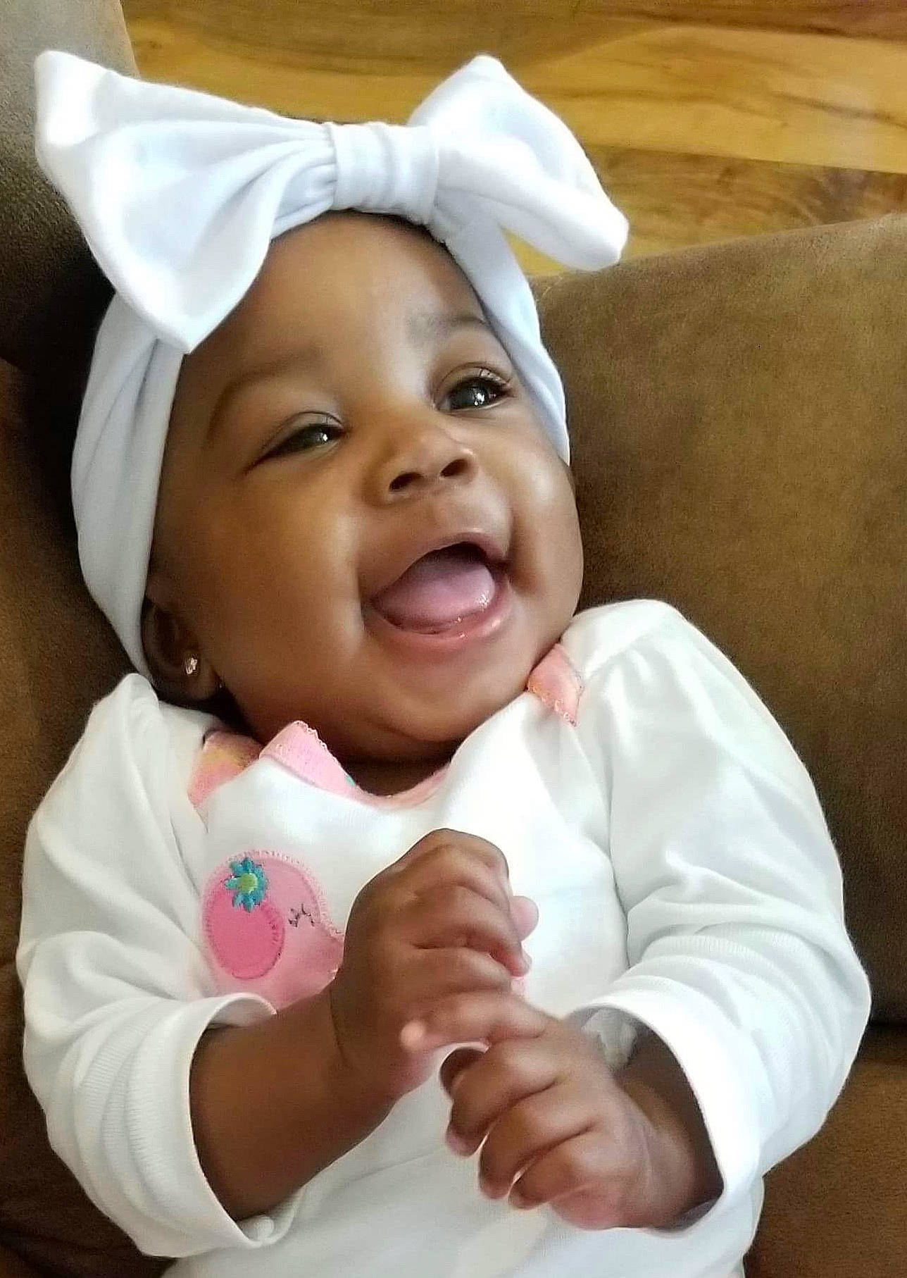 Kelani joined the competition — help win amazing prizes! child, ear, girl, hair_accessory, headgear, infant, nose, person, product, skin, smile, toddler