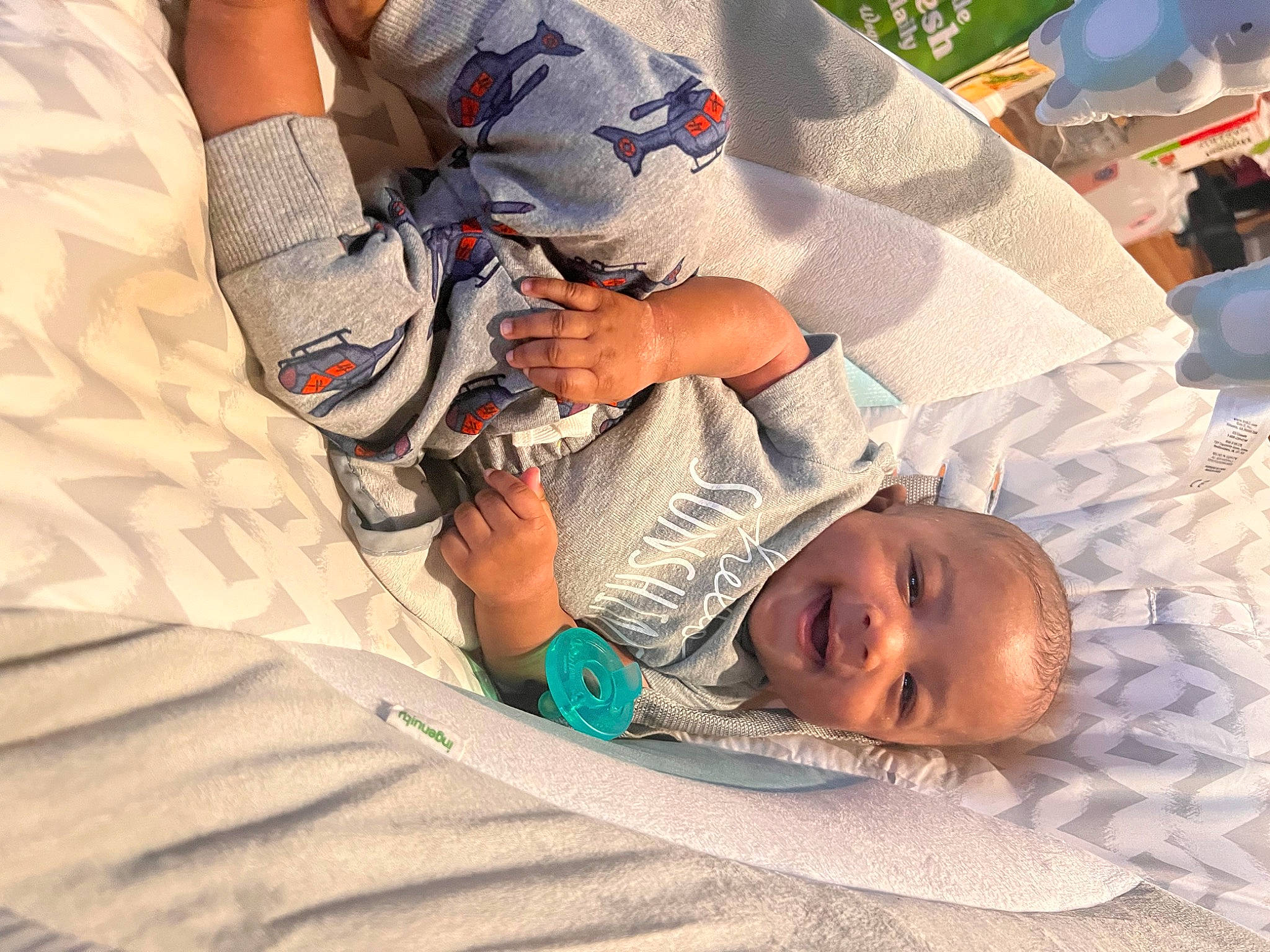Jace is registered to the contest to win money with this photo: baby, baby_products, bedding, bedtime, child, comfort, elbow, fun, grass, happy, human_leg, leisure, linens, nap, person, room, sitting, smile, thigh, toddler