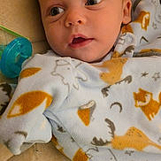 Gabriel joined the competition — help win amazing prizes! animal_print, baby, blanket, child, clothing, cozy, cute, expression, eyes, face, head, human, indoor, infant, newborn, pacifier, portrait, skin, soft, young