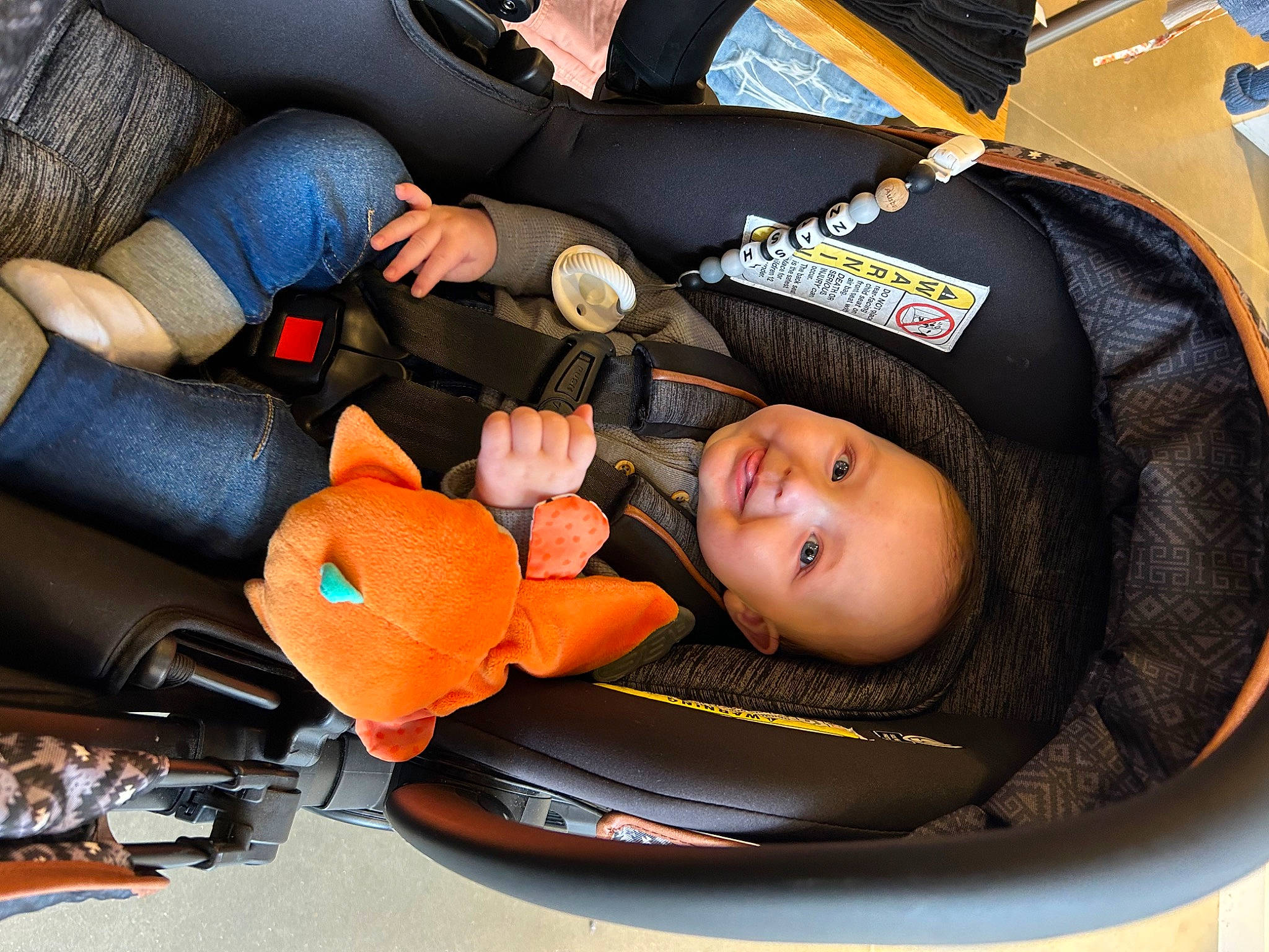 Nash is registered to the contest to win money with this photo: auto_part, automotive_design, automotive_wheel_system, baby, baby_carriage, baby_in_car_seat, baby_products, baby_toddler_clothing, bag, car_seat, car_seat_cover, child, comfort, family_car, joy, lap, motor_vehicle, person, steering_wheel, toddler