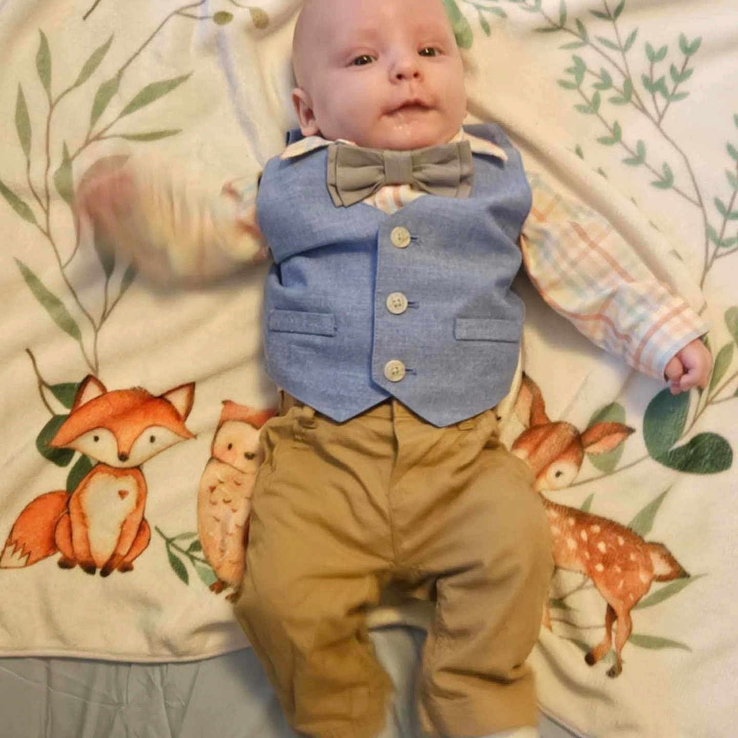 Finnic joined the competition — help win amazing prizes! animal_print, baby, blanket, bow_tie, child, cute, deer, fox, indoors, infant, lying_down, owl, pants, person, plaid_shirt, portrait, smiling, socks, soft_toys, vest